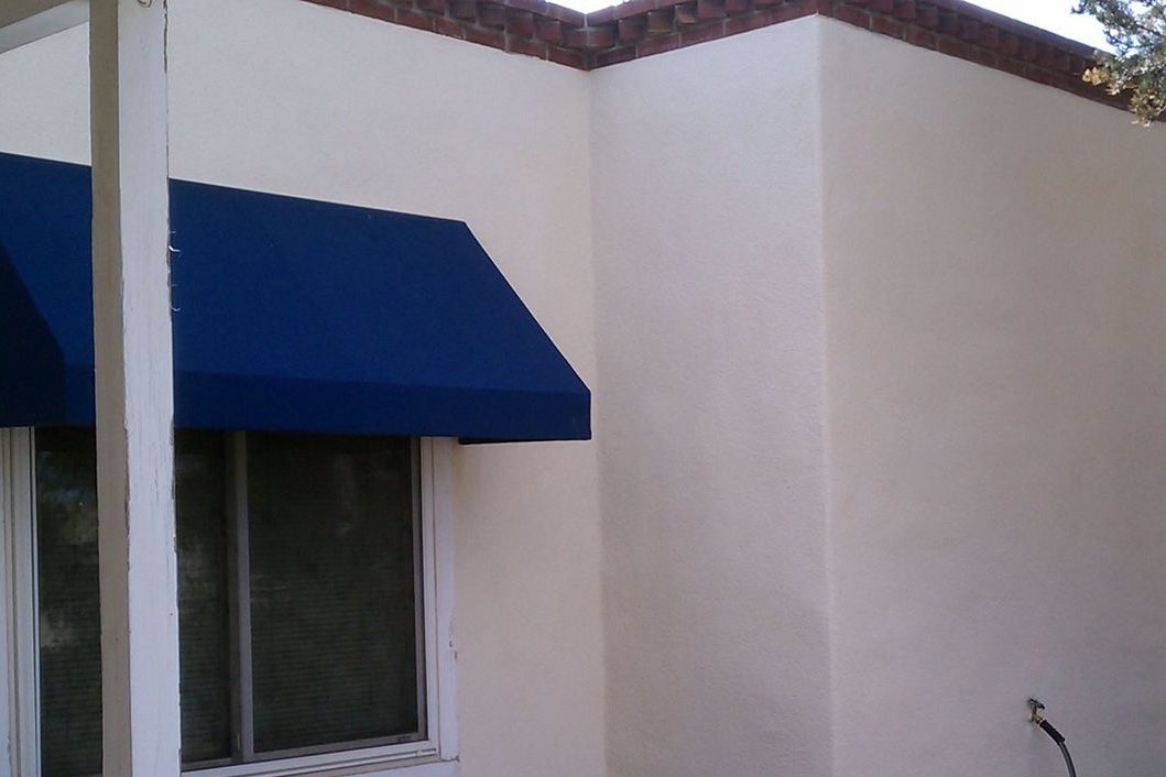 Albuquerque NE Heights home with a new light finish over spray foam exterior walls